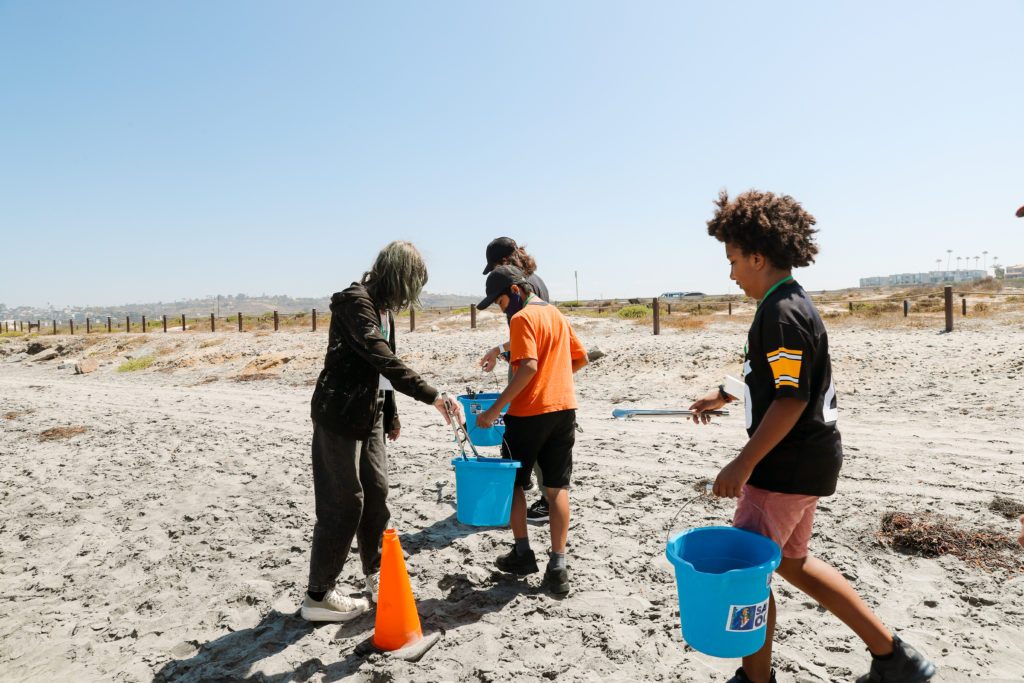 A beach cleanup along Cardiff State Beach encouraged campers to think about their potential impacts on our environment.