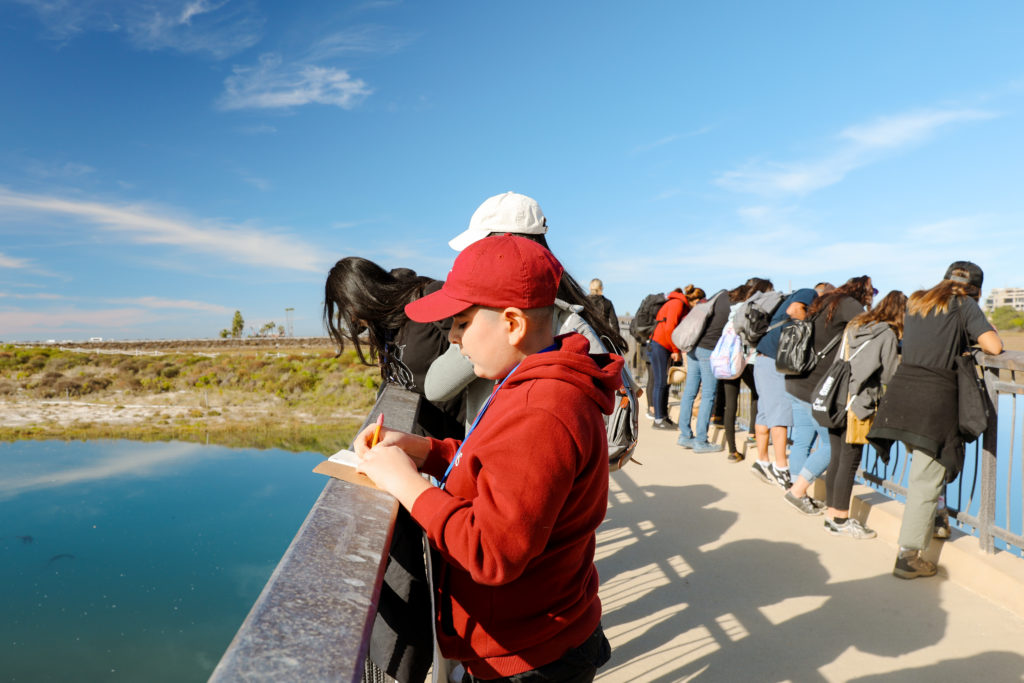 A group of student at the San Elijo Lagoon bridge