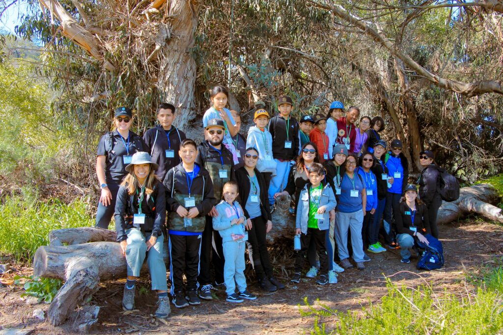 Group of students and their families along the trail